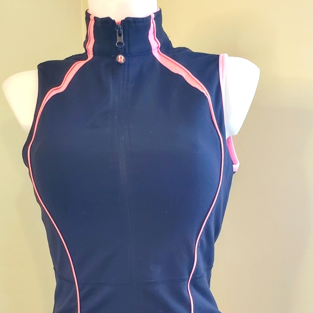 Lululemon Black with Pink Trim Vest. Pocket in Back. Running Workout Train